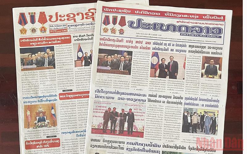 Báo chí Lào đưa tin về hoạt động của Chủ tịch Quốc hội Vương Đình Huệ tại Lào -0